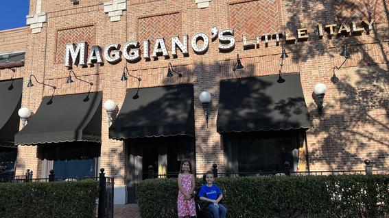 Harrison and his twin sister outside Maggiano's